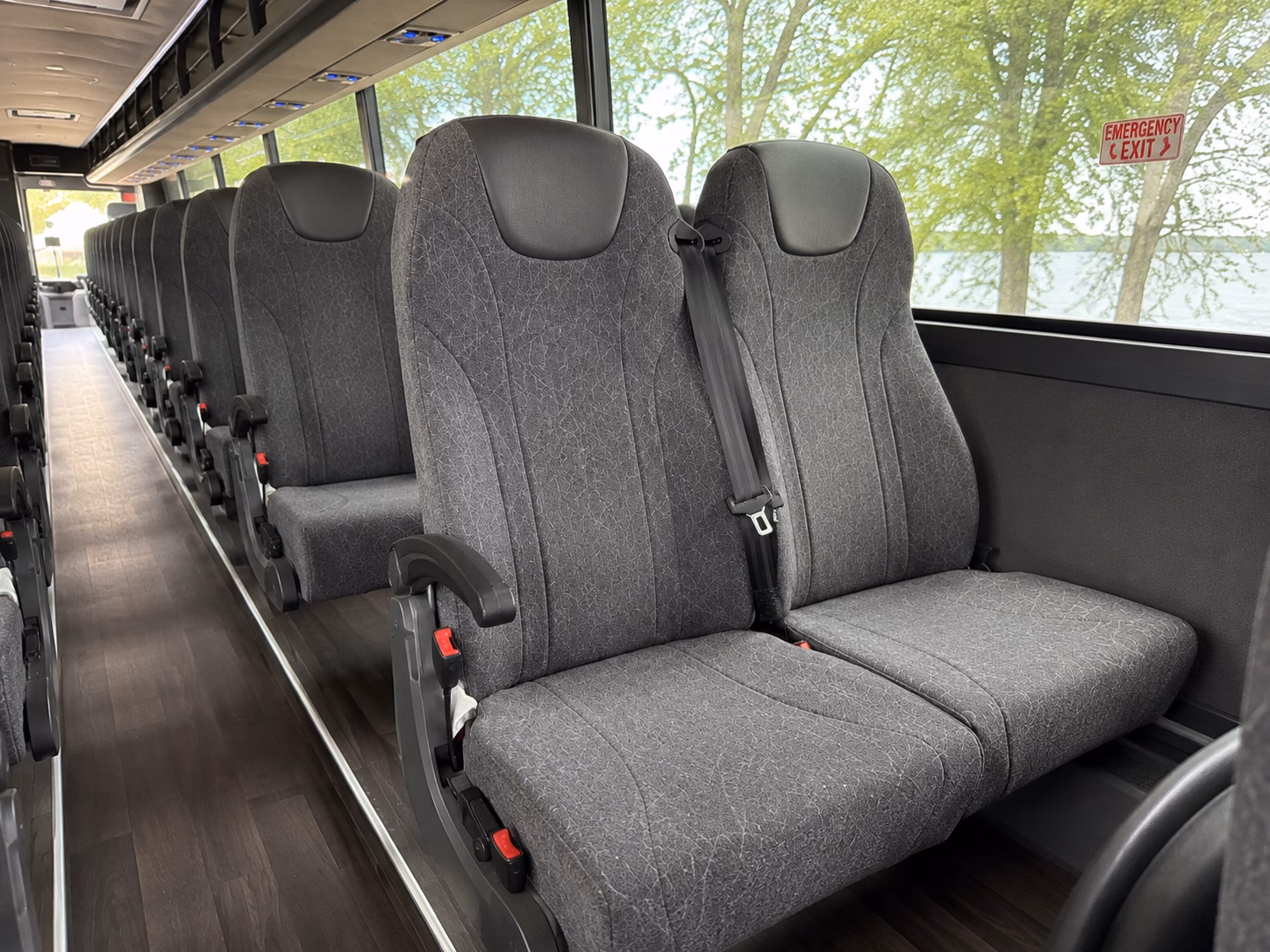 book a charter bus from flint to ann arbor or east lansing for game day