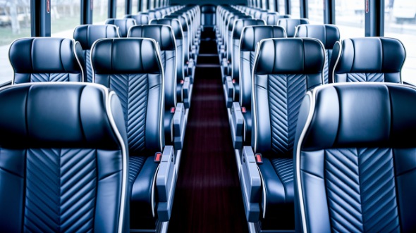 56 passenger charter bus rental troy
